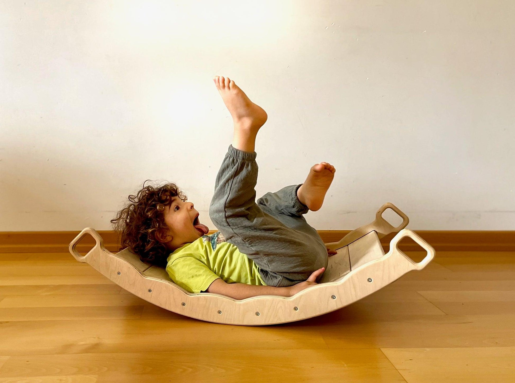 montessori balance board laying down