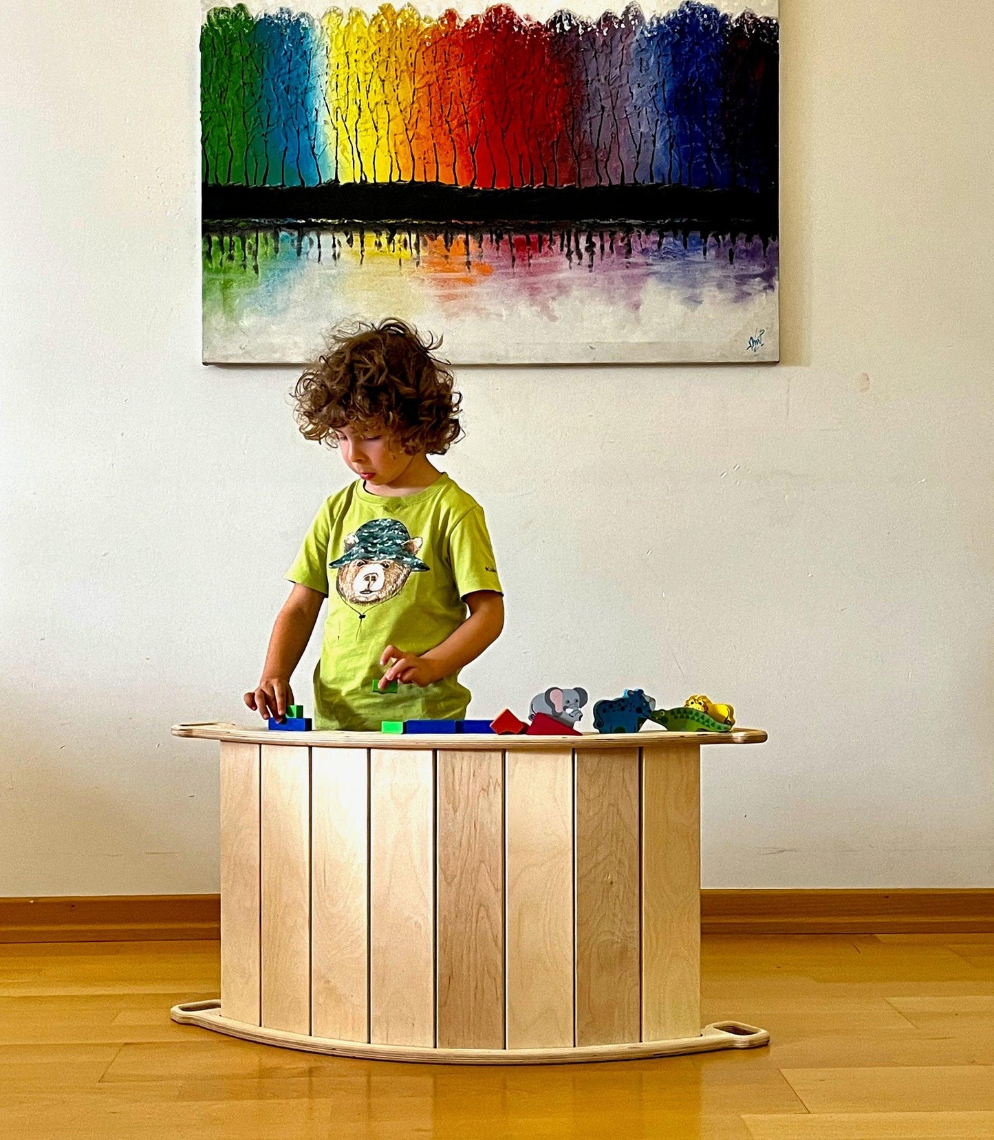 montessori balance board on top