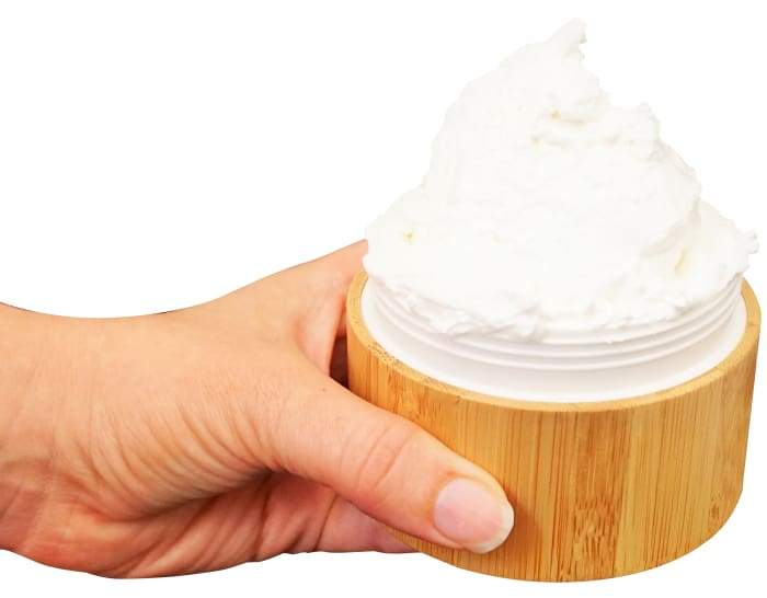 body butter energy cream in hand